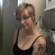 A cute, blonde girl with short hair, tattoos and glasses talks to the camera as she takes a shit while sitting on a toilet. Finished product shown. This would have been a great video if frame rate was faster and audio was in sync. Over 10.5 minutes.